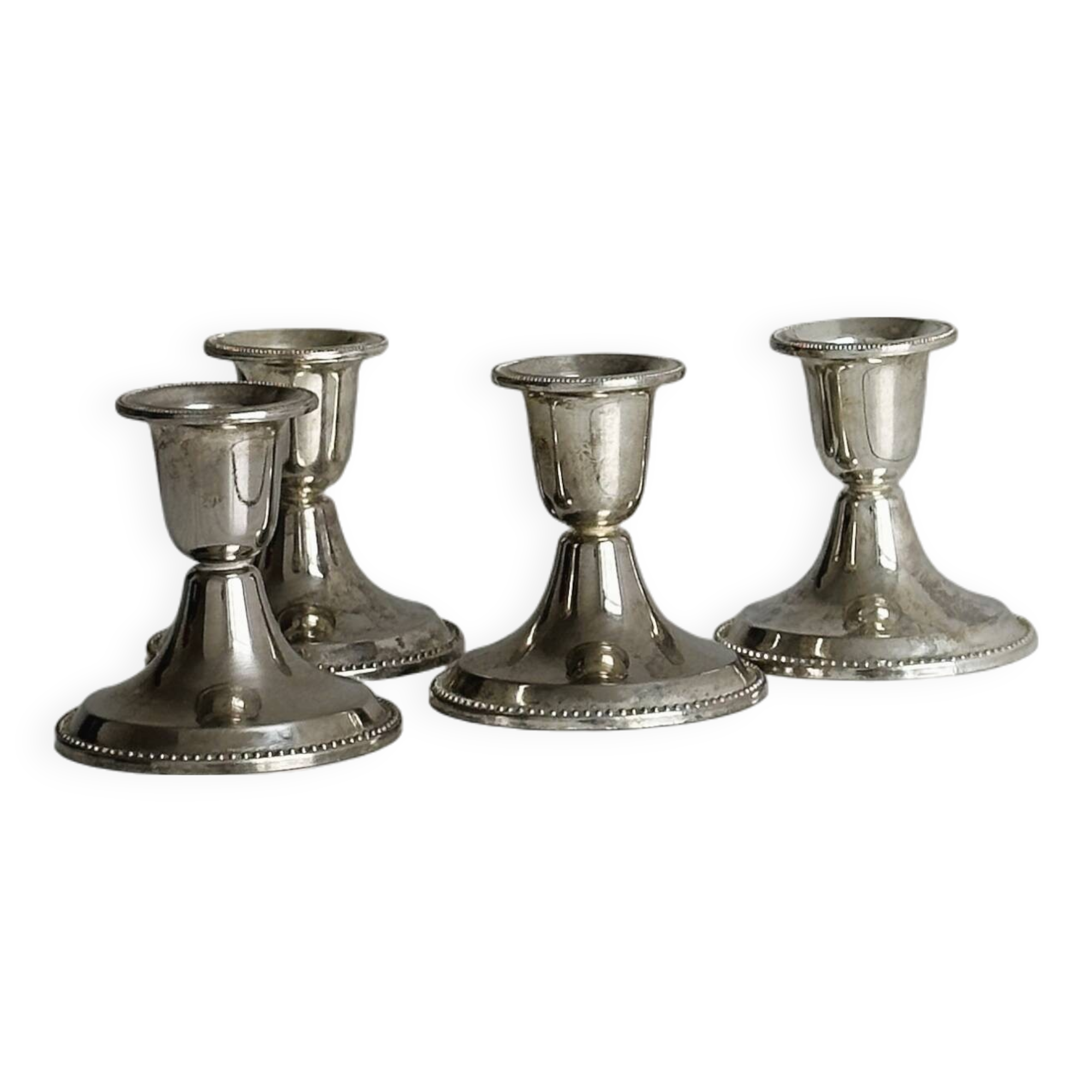 4 vintage metal candle holders