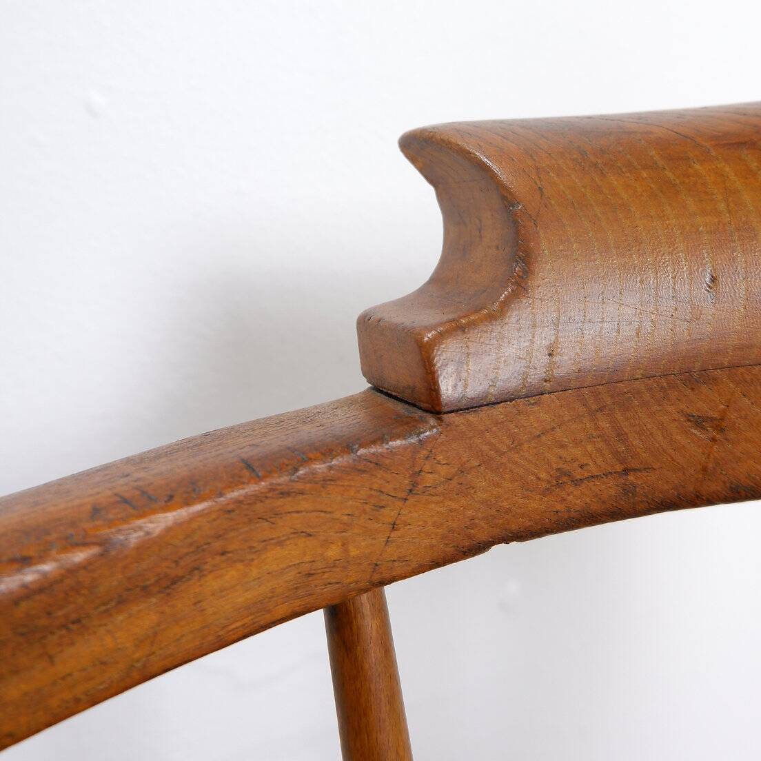 Elm armchair with curved back
