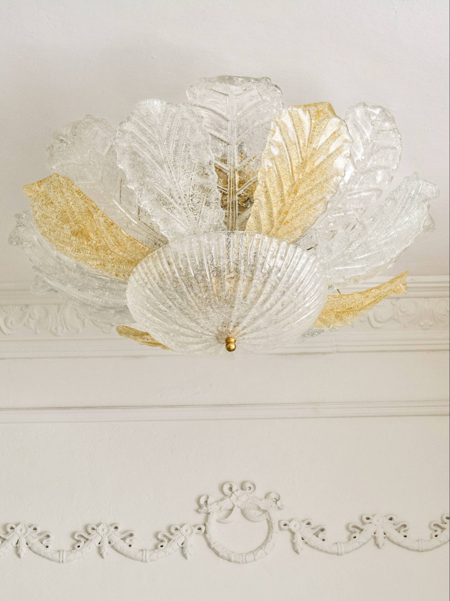 Vintage Murano chandelier/ceiling light with 16 white and amber leaves.