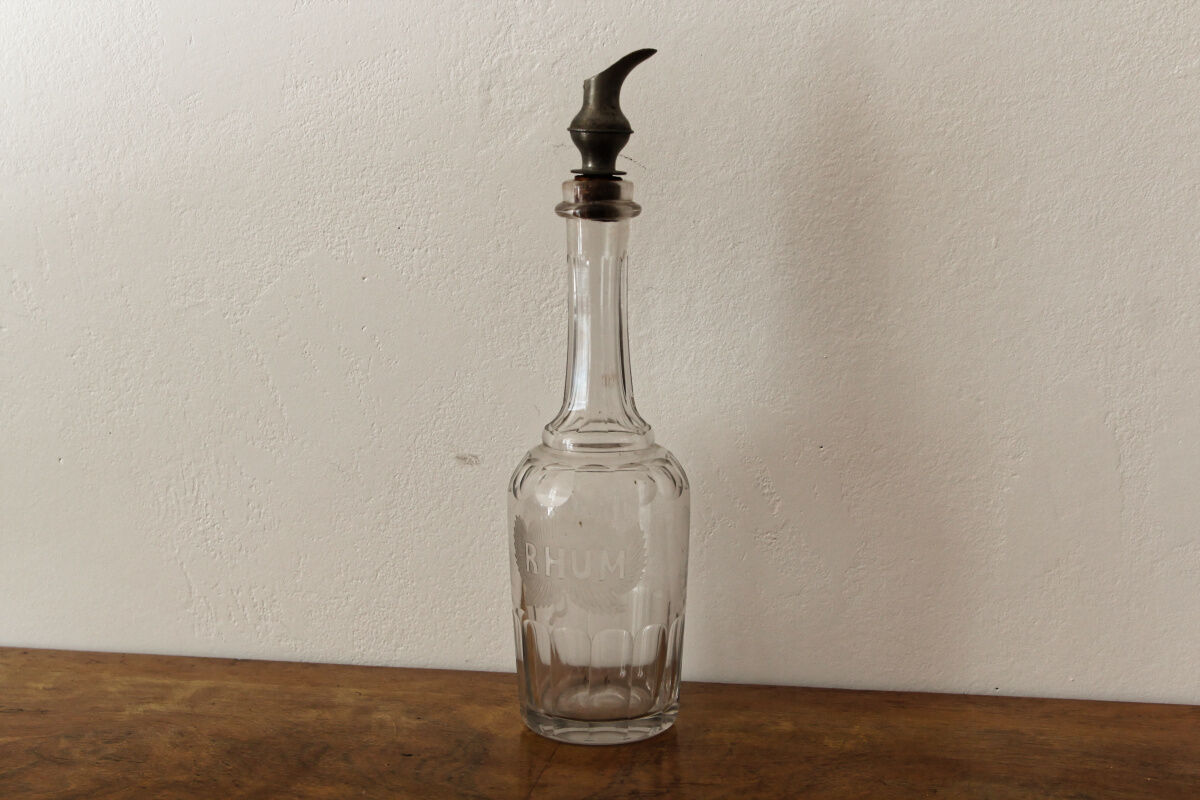Chiseled glass rum bottle