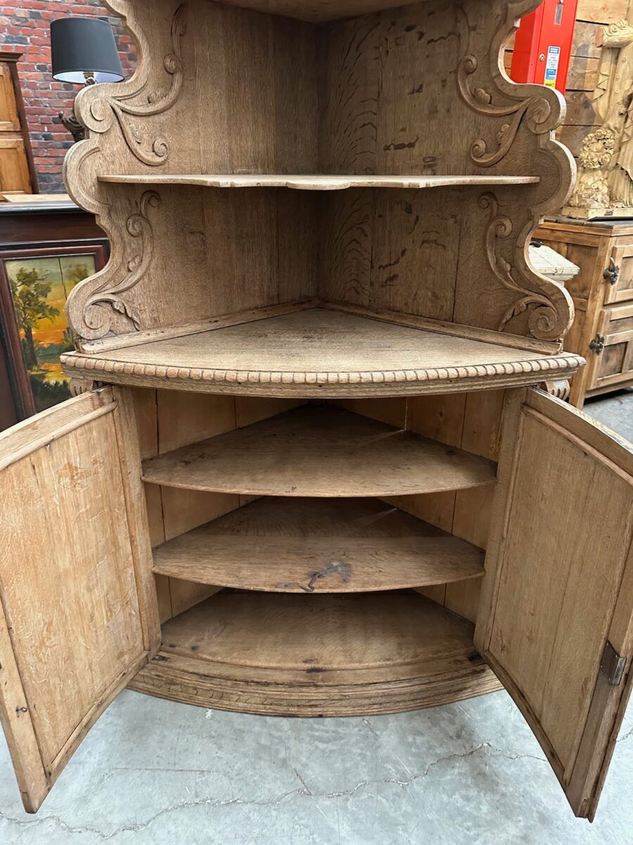 Corner cabinet in oak, late 19th century.