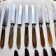 18 Wiskemann table knives in horn
