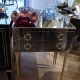 Pair of nightstands in anthracite colored glass and brass