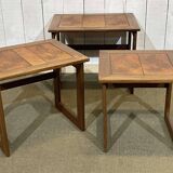 Set of 3 nesting tables in teak with tiled tops.