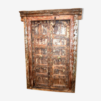 Old ancient indian door of Rajasthan in old teak wood - functional