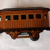 Small JEP mechanical train, including locomotive, tender, sleeping car, rail, 1930s