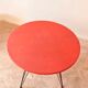 Table basse rouge année 50