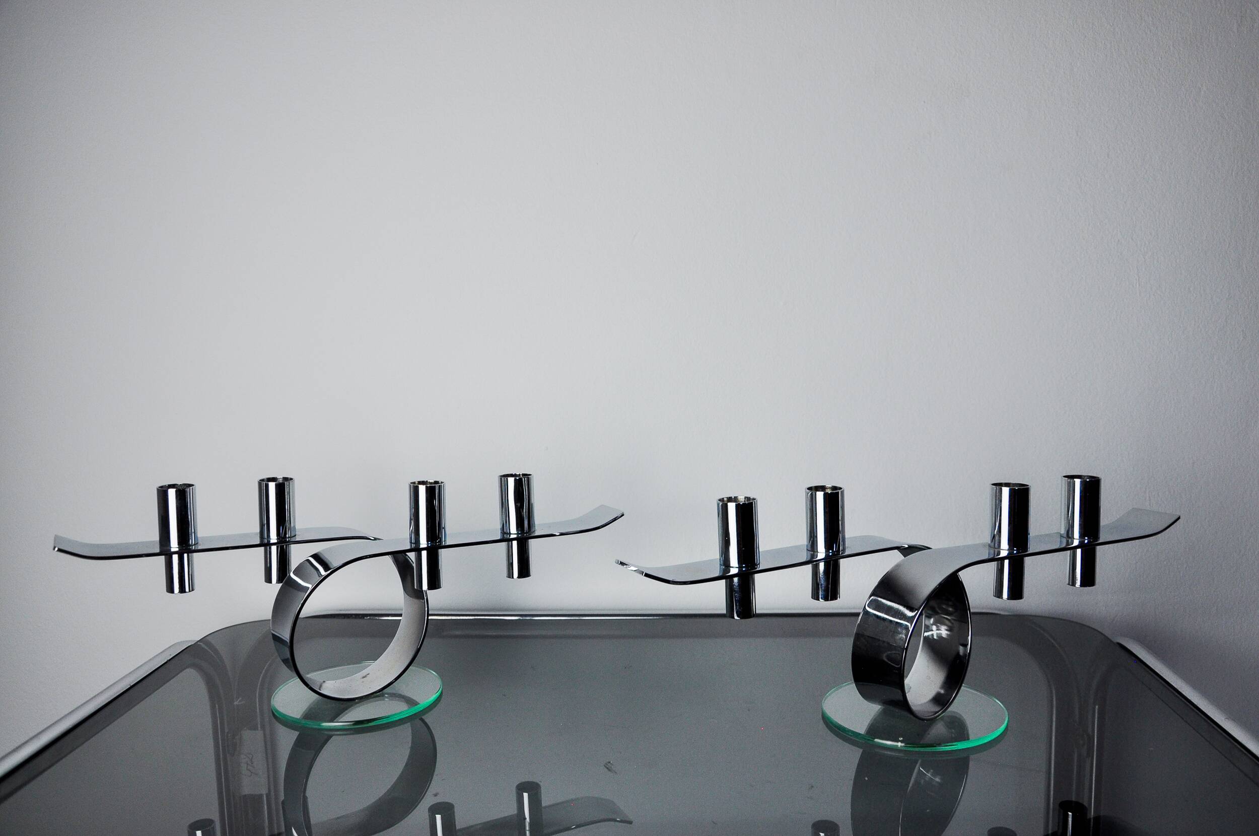 Pair of space-age 4-flame candlesticks, glass and metal, Germany, 1980