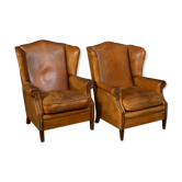 Ensemble de 2 fauteuils en peau de mouton hollandais