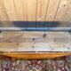 English gateleg coffee table in solid fir from the early 20th century.