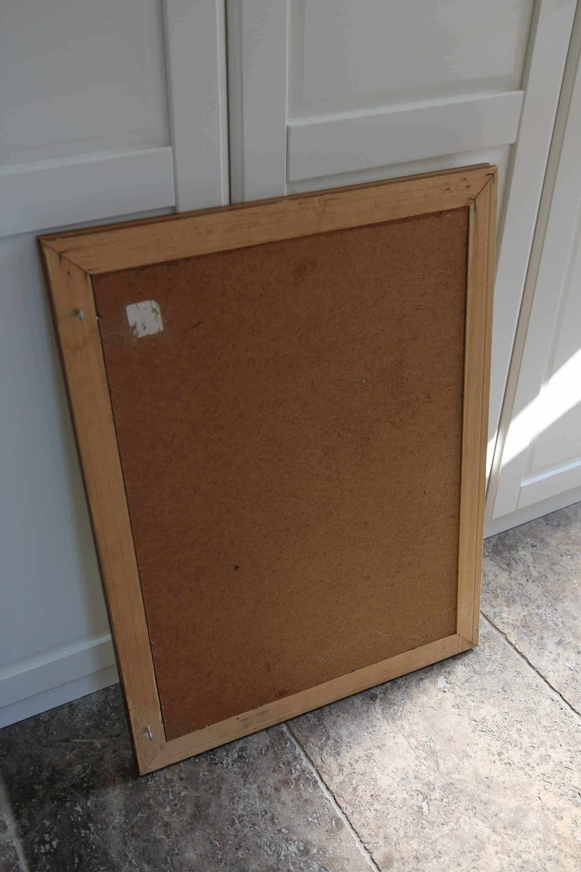 Large beveled mirror in carved wood