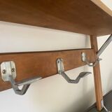 Wall-mounted coat rack with vintage hooks