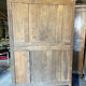 19th-century Norman wedding armoire, with bouquets of flowers and doves.