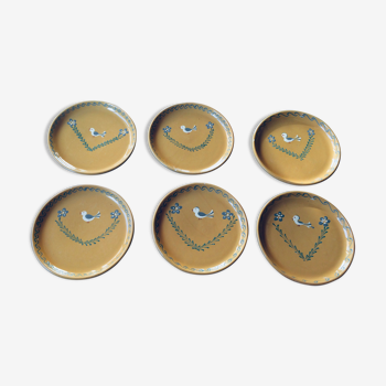 The six Piaf plates in painted terracotta