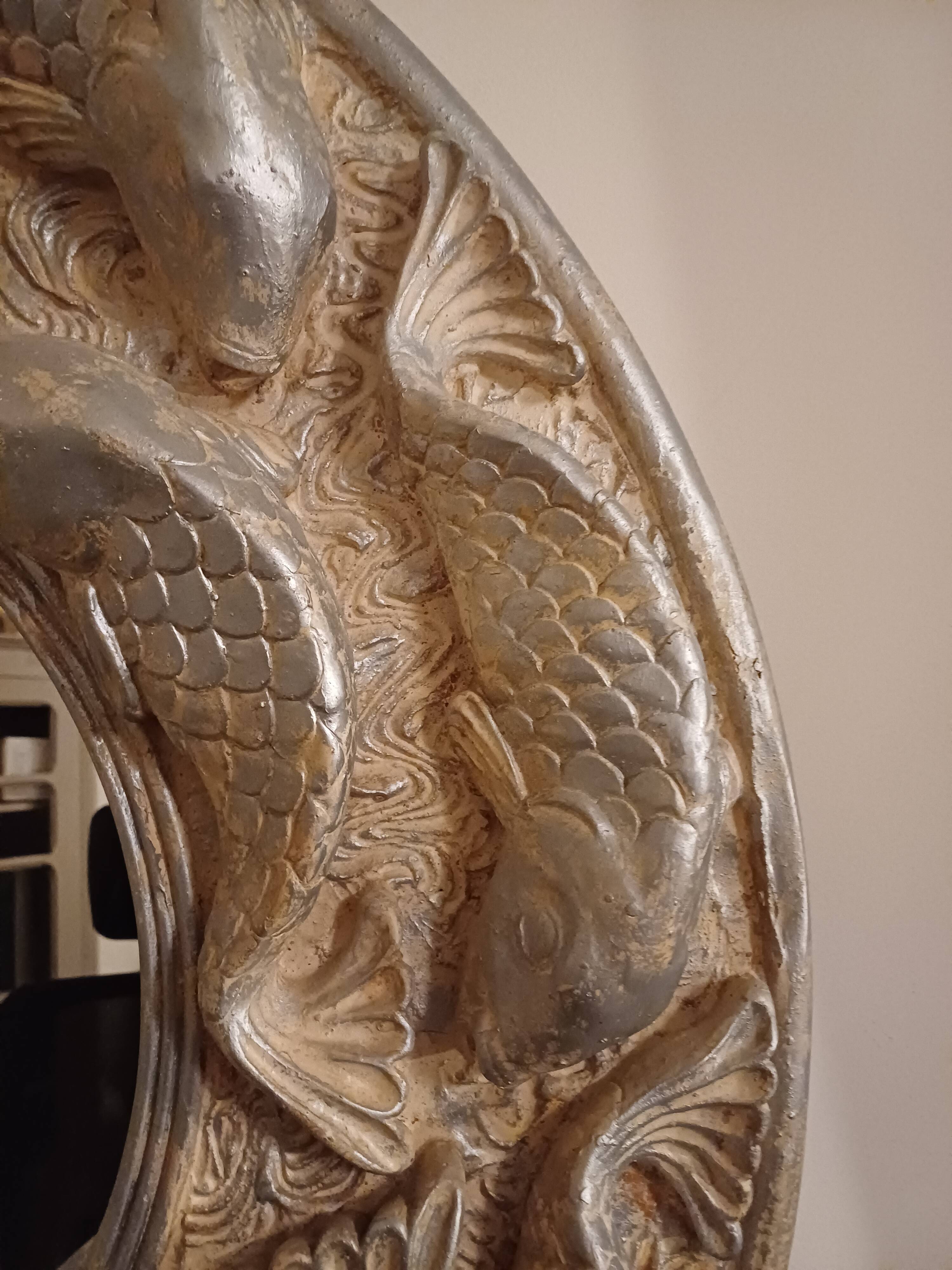 Wall-mounted mirror with silver fish by Alan Wallis Designs from the 1980s.