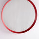 Vintage red round plastic mirror from the 1960s.