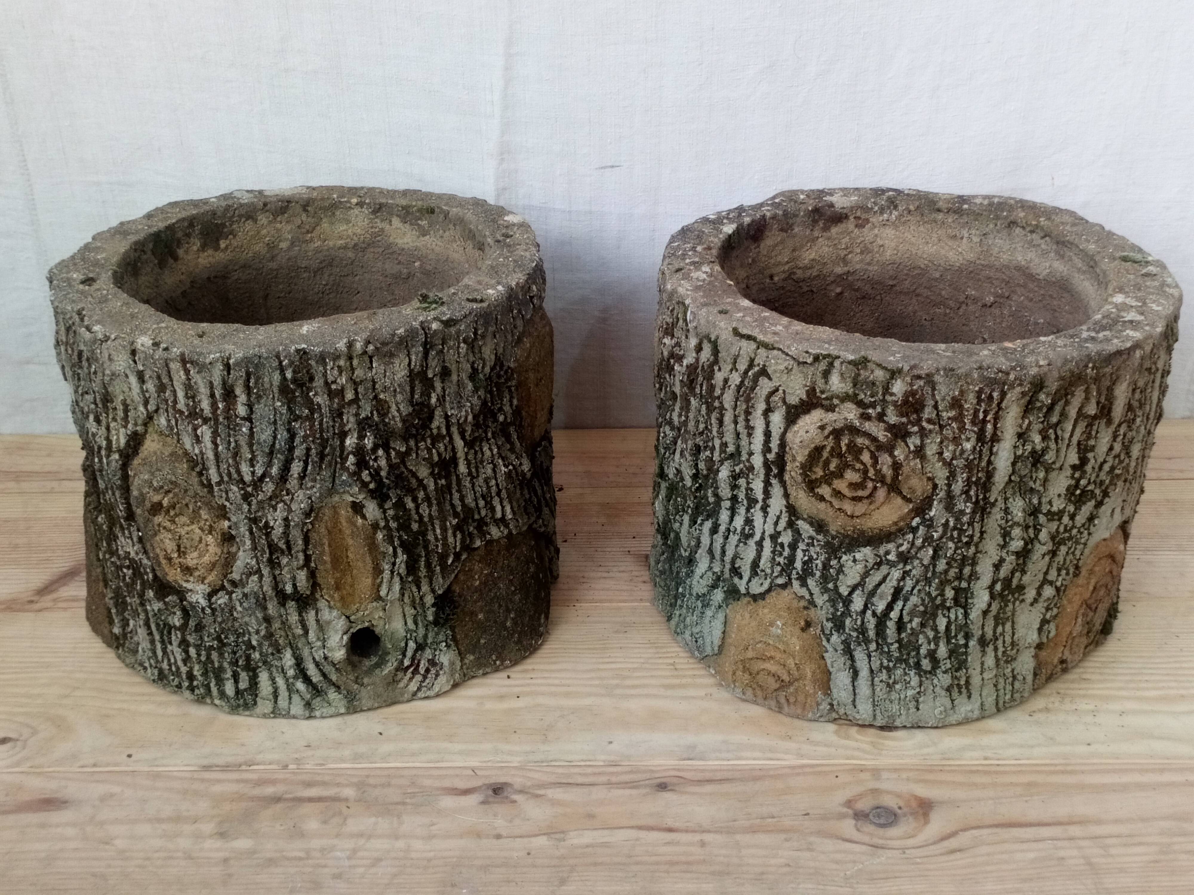 Pair of old rock garden planters in concrete