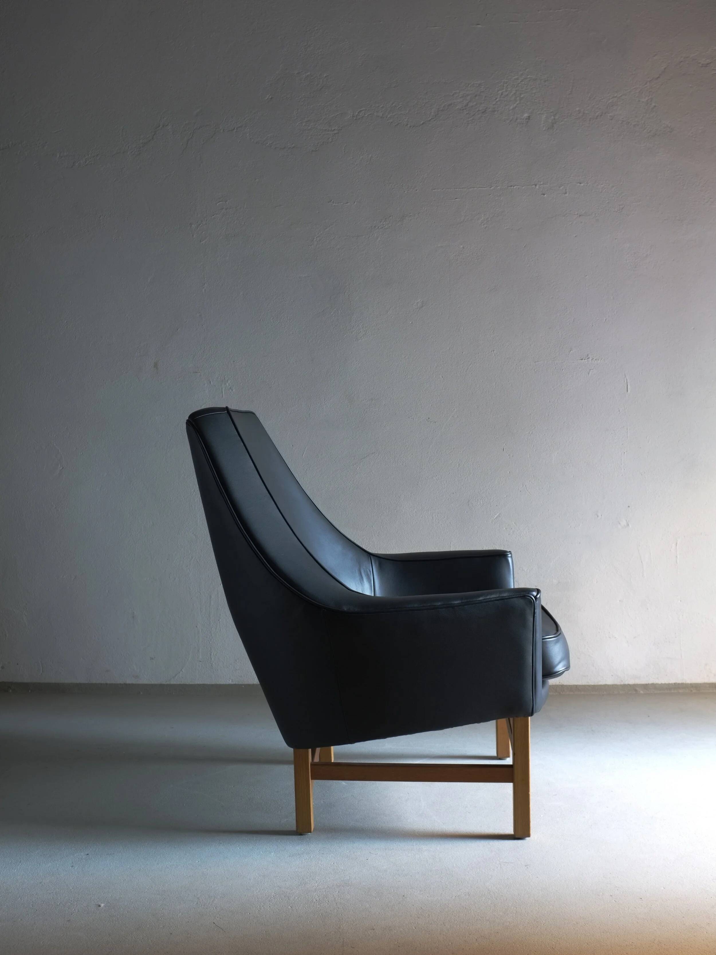 IB Kofod-Larsen leather oak easy chair | OPE Sweden | 1960s