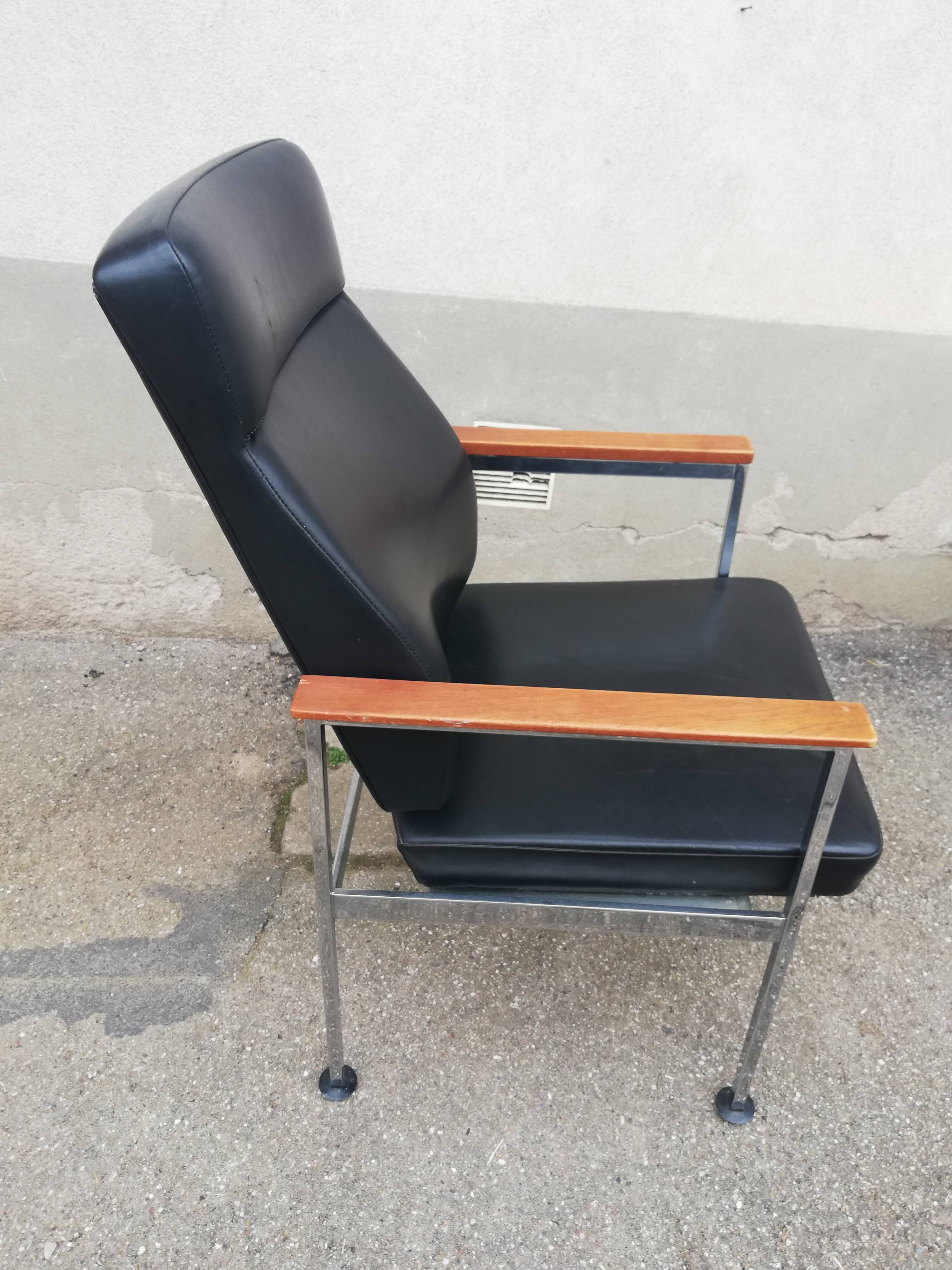 Vintage leather and teak armchair