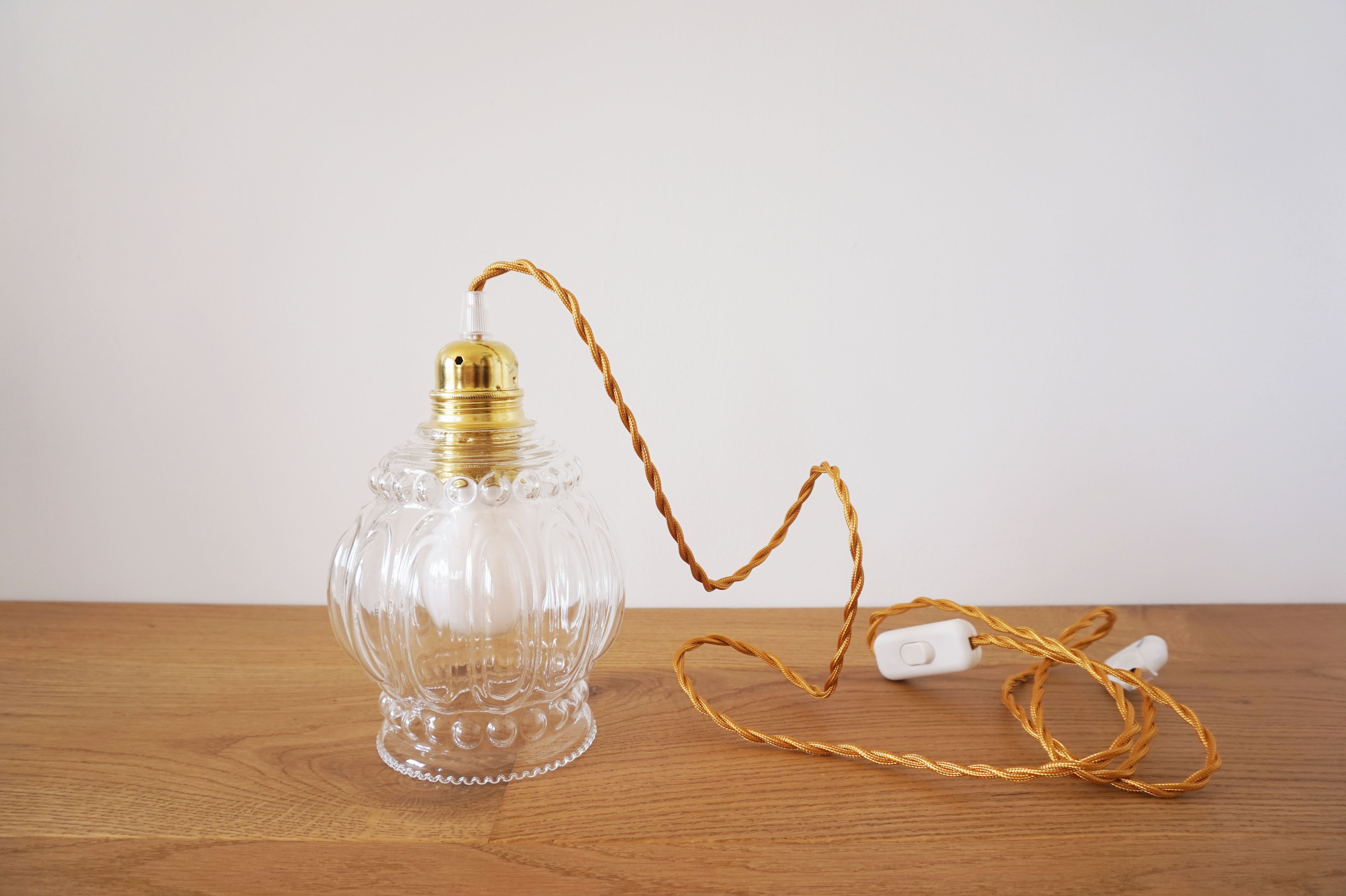 Suspension molded glass globe player