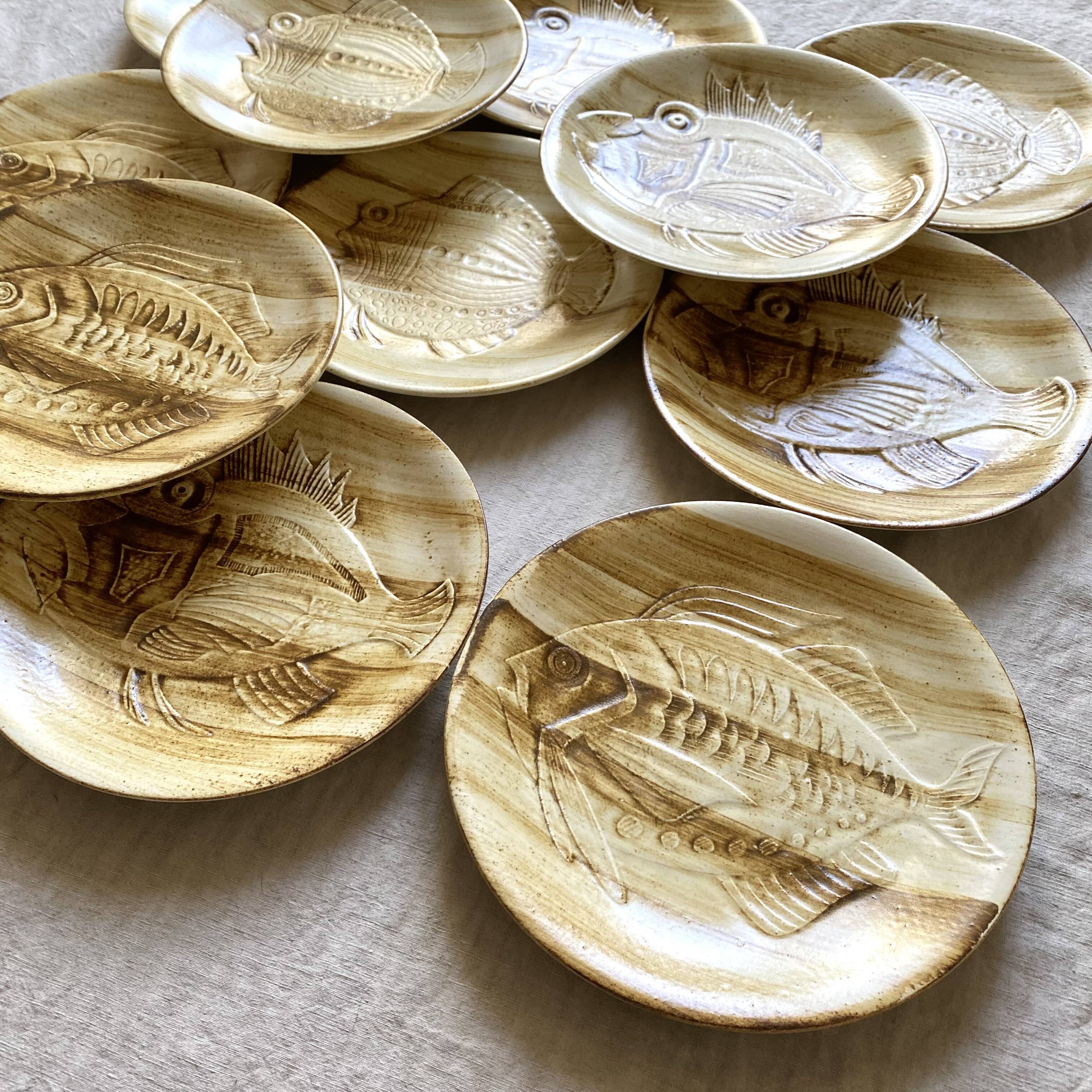 Longchamp dinner plates with fish decor