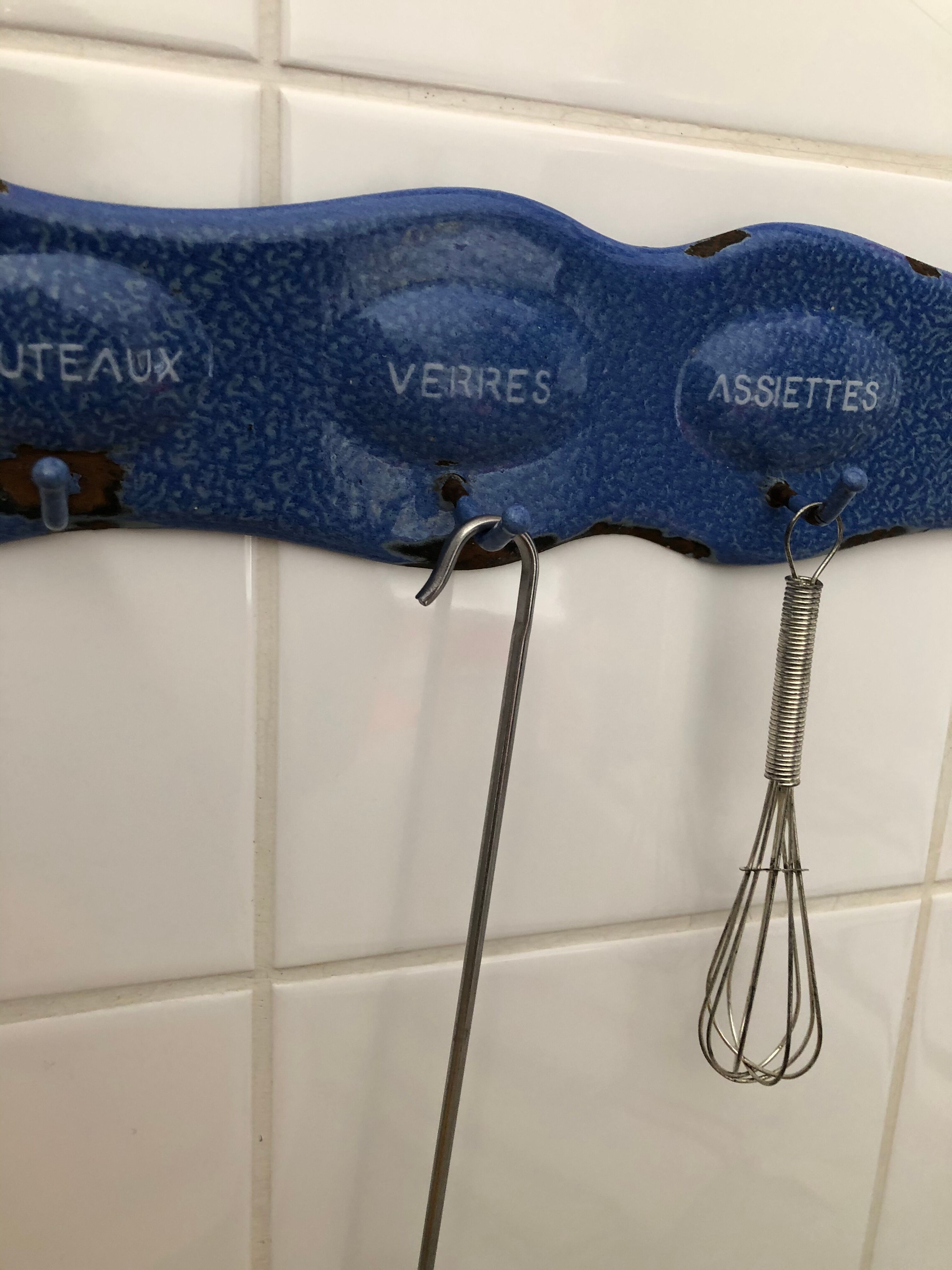 Old enamelled tea towel door