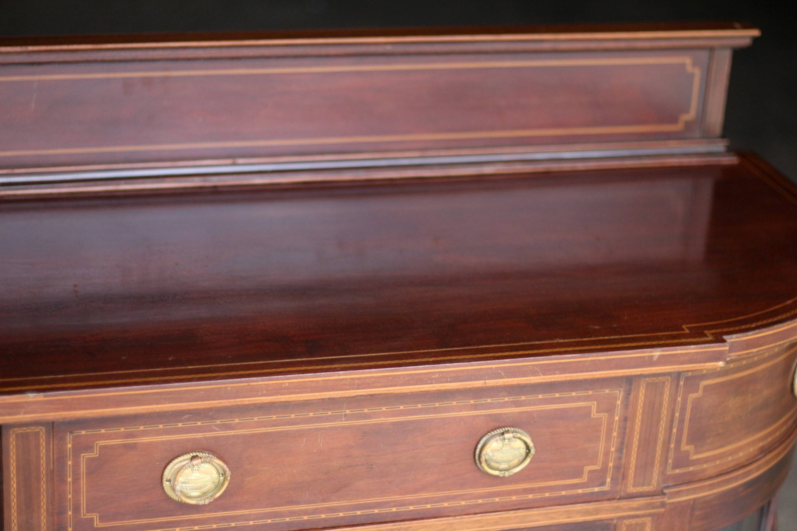 Elegant console by waring & gillow ltd, in mahogany veneer.