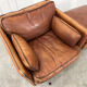 Club armchair and its ottoman 1980s