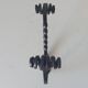 Brutalist wall coat rack in wrought iron.