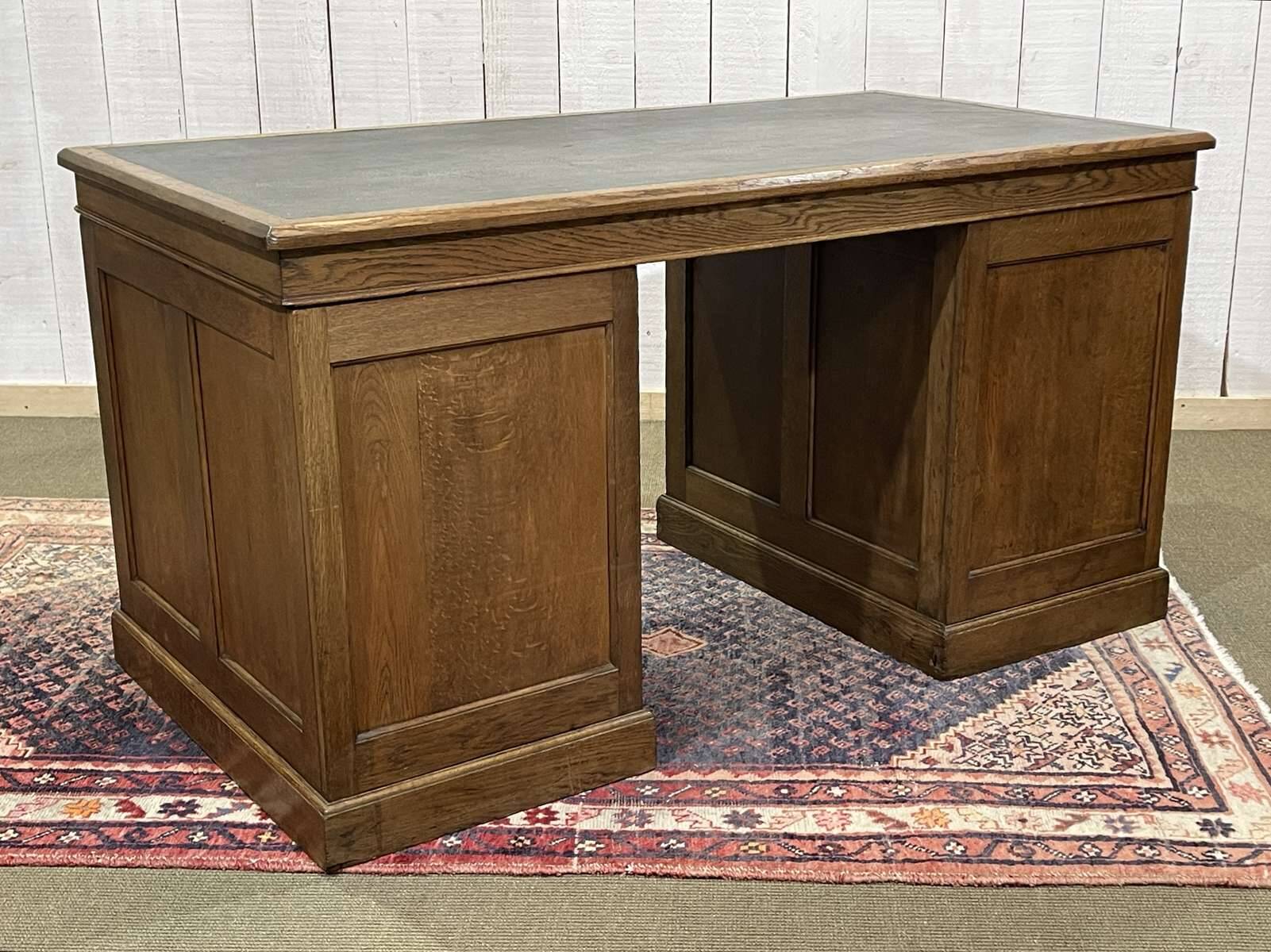 Early 20th century English flat desk in oak