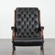 Fauteuil chesterfield en cuir de vachette noir classique et confortable