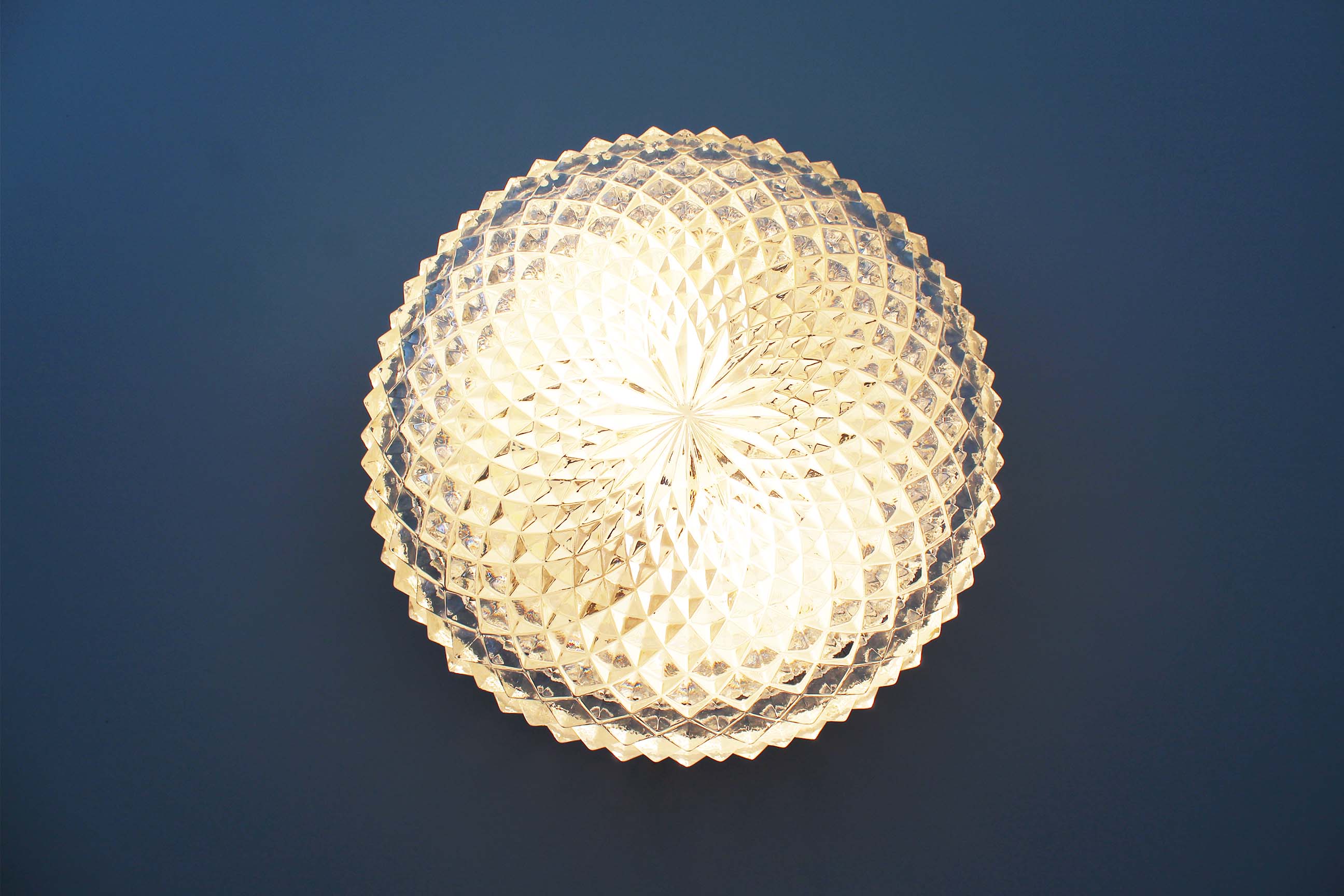 1970's Heavy round crystal glass wall sconce by Massive Belgium