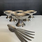 Set of 6 vintage stainless steel ice cream bowls with spoons.