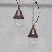 Pair of brass and clear glass industrial pendants
