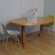 Oak oval table with extension cords