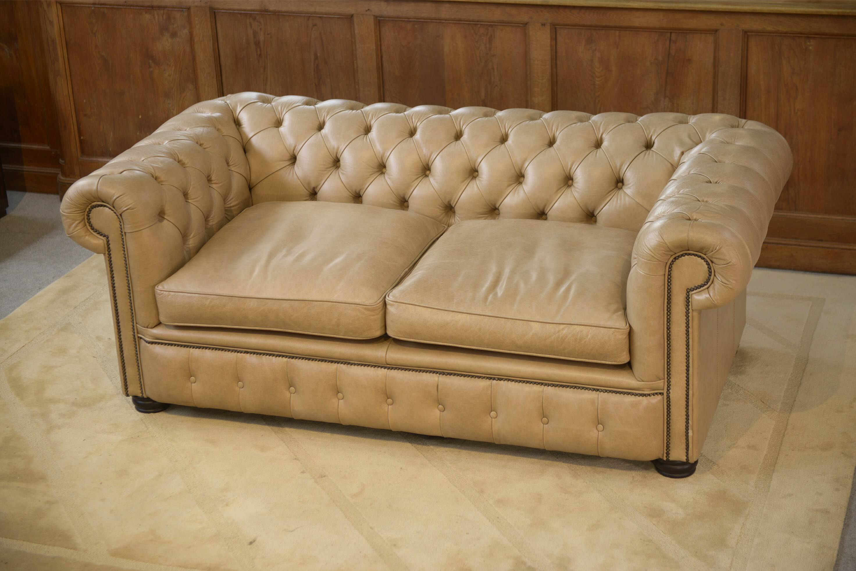 Beige leather Chesterfield sofa handmade in England.