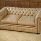 Beige leather Chesterfield sofa handmade in England.