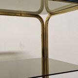 Hollywood Regency gilt metal and smoked glass shelf, Italy circa 1970