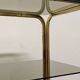 Hollywood Regency gilt metal and smoked glass shelf, Italy circa 1970