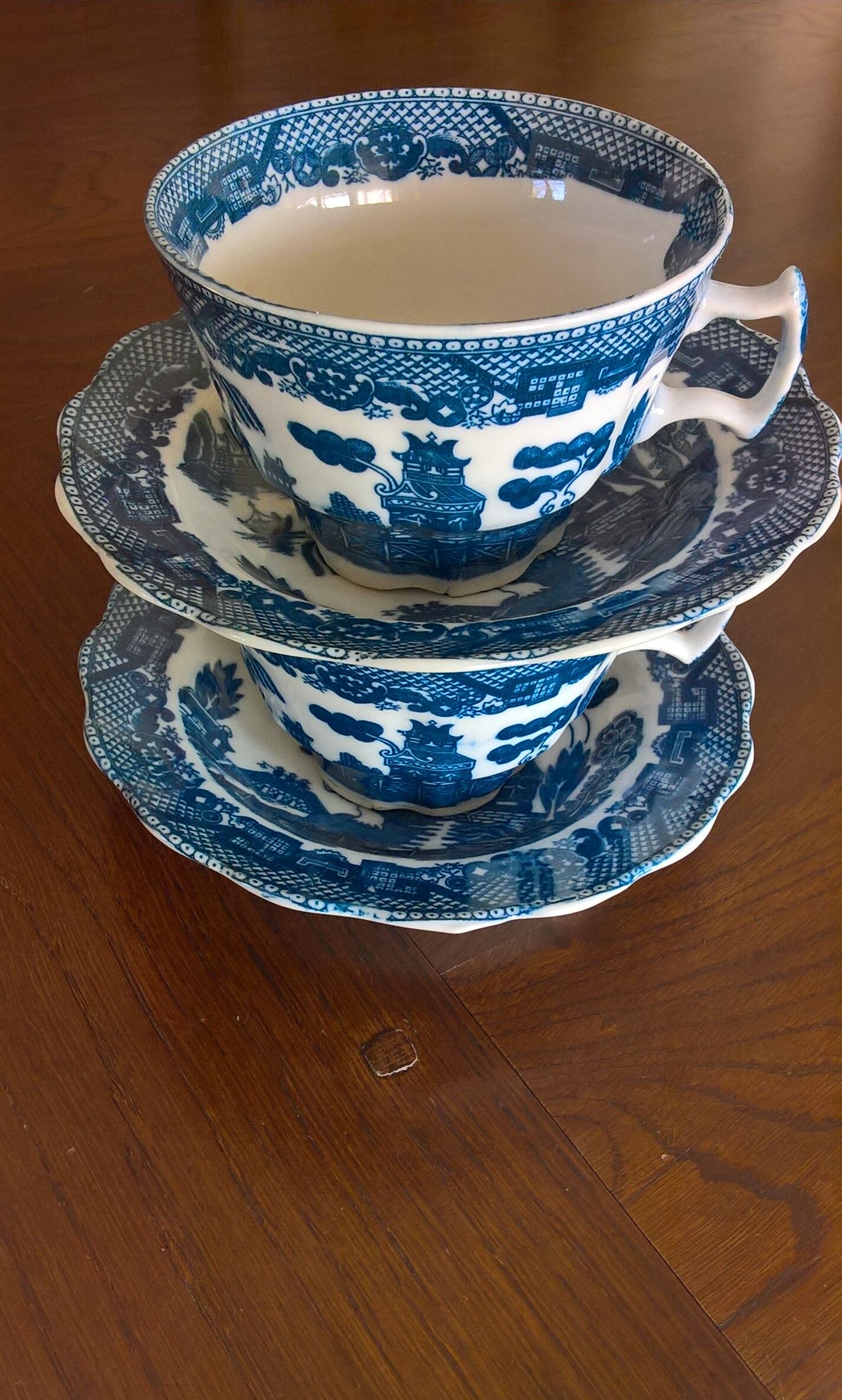 Two Blue Willow porcelain tea cups