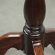 Round antique side/wine table from the late 18th century with a subtle foot