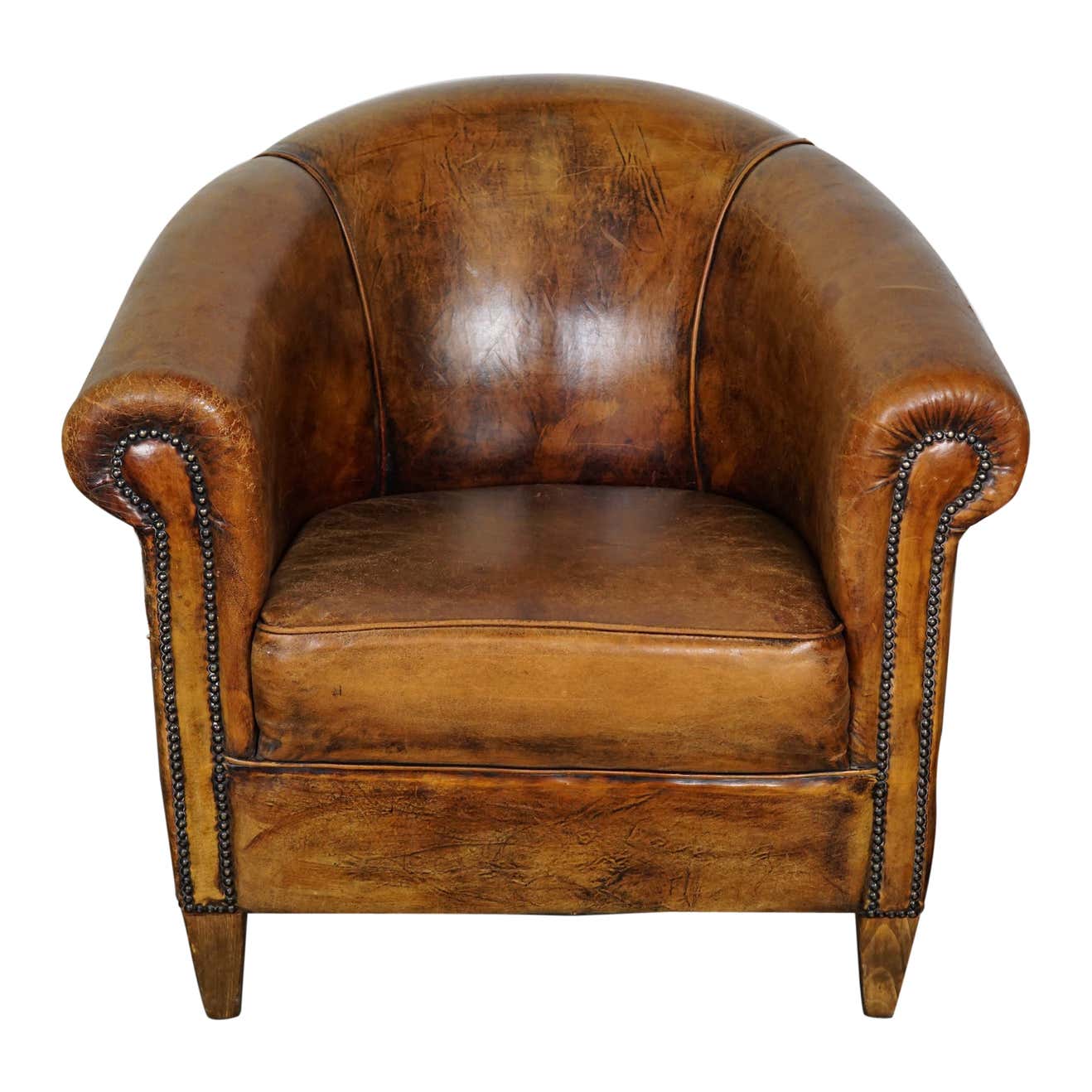 Vintage club armchair in leather color cognac Netherlands