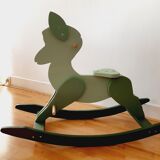 Cheval de bois à bascule