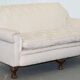 Victorian suite in damask, walnut frame, legs carved in lion's paw.