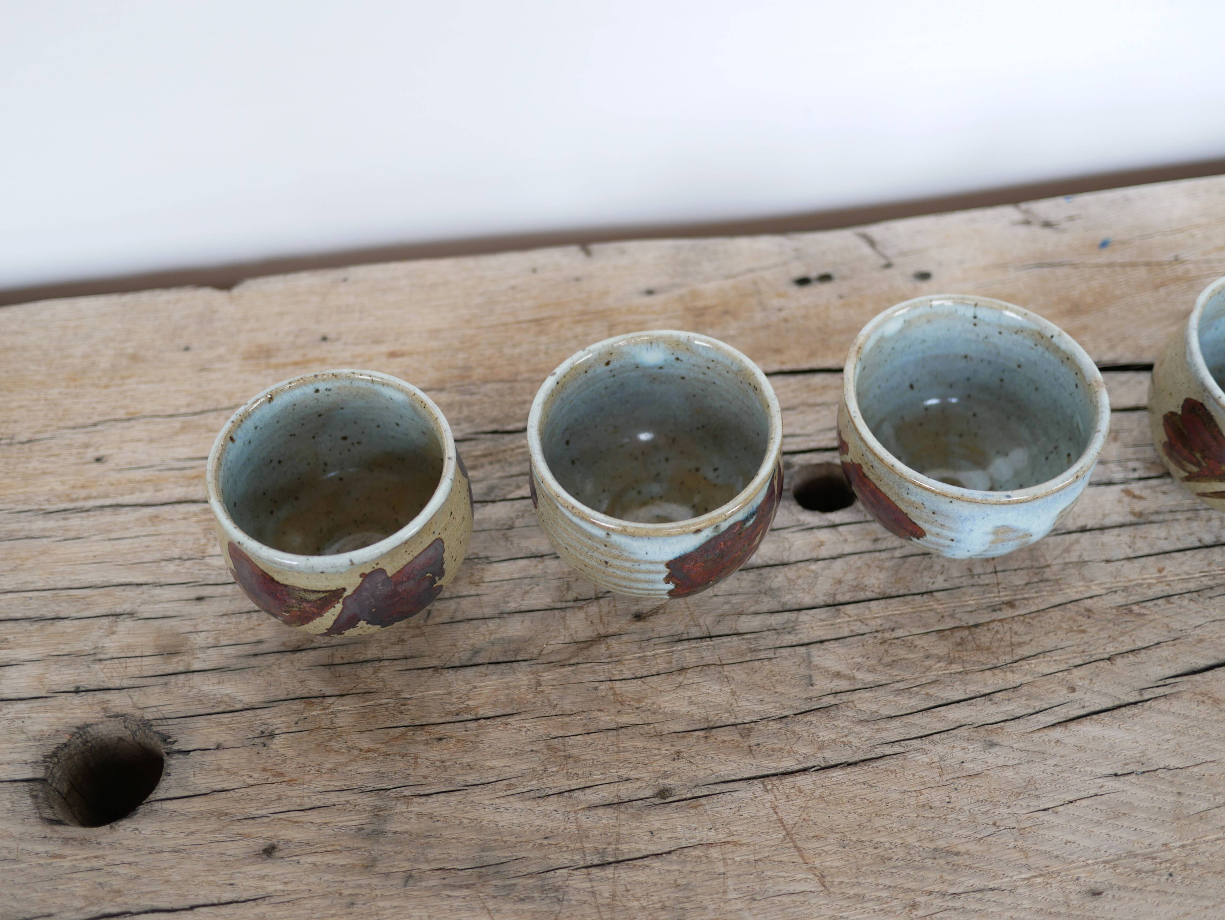 Series of 5 vintage stoneware cups