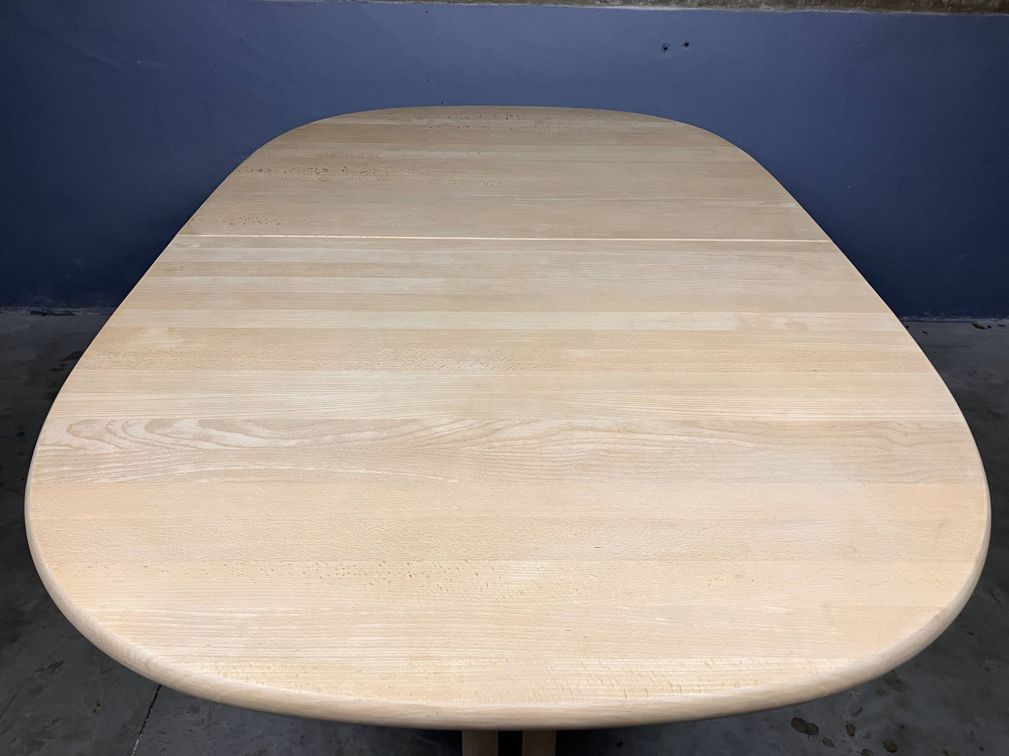 Oval extendable dining table in beech with Danish design.
