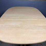 Oval extendable dining table in beech with Danish design.