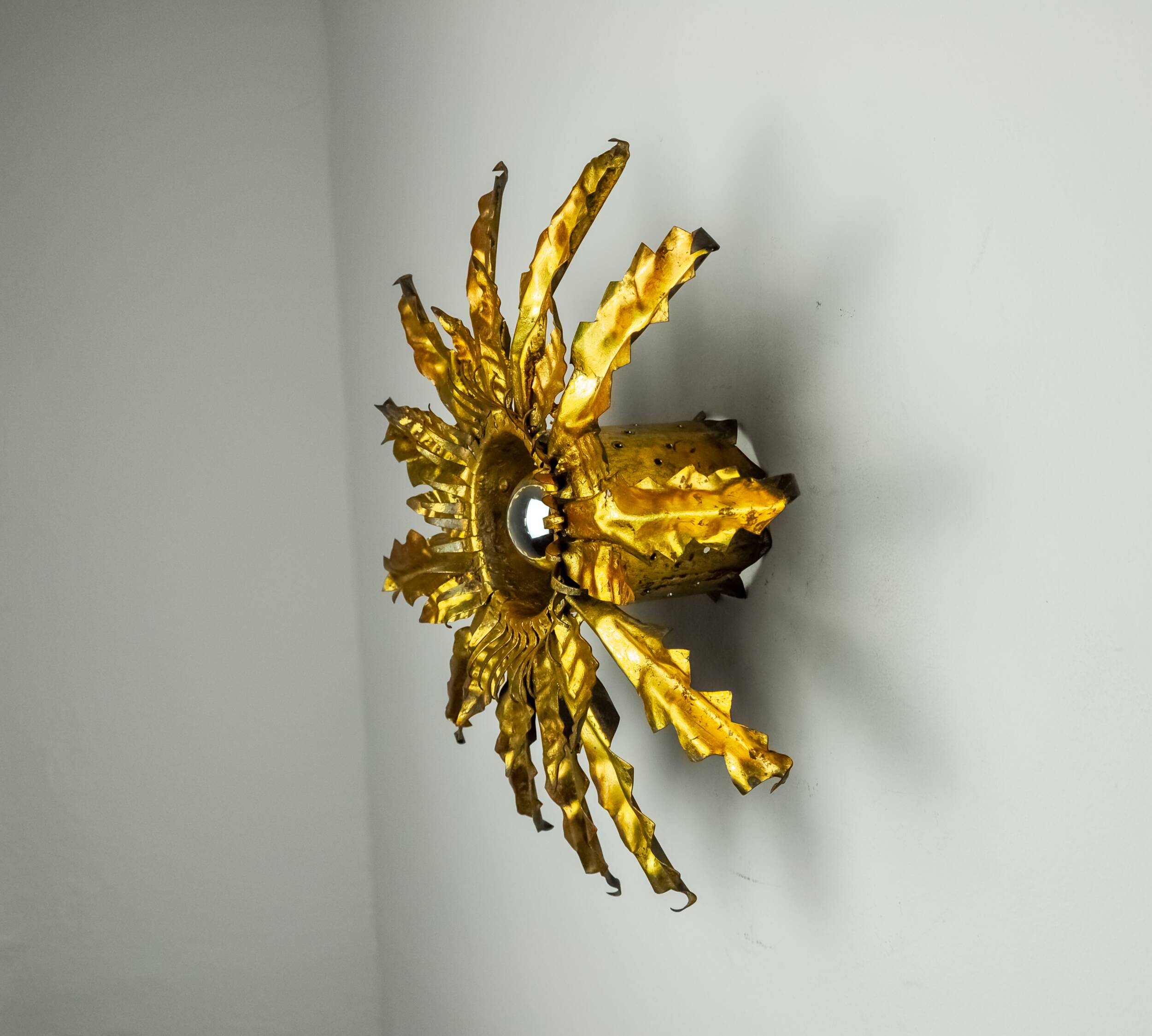 Brutalist sun wall lamp, metal and gold leaf, Italy, 1960