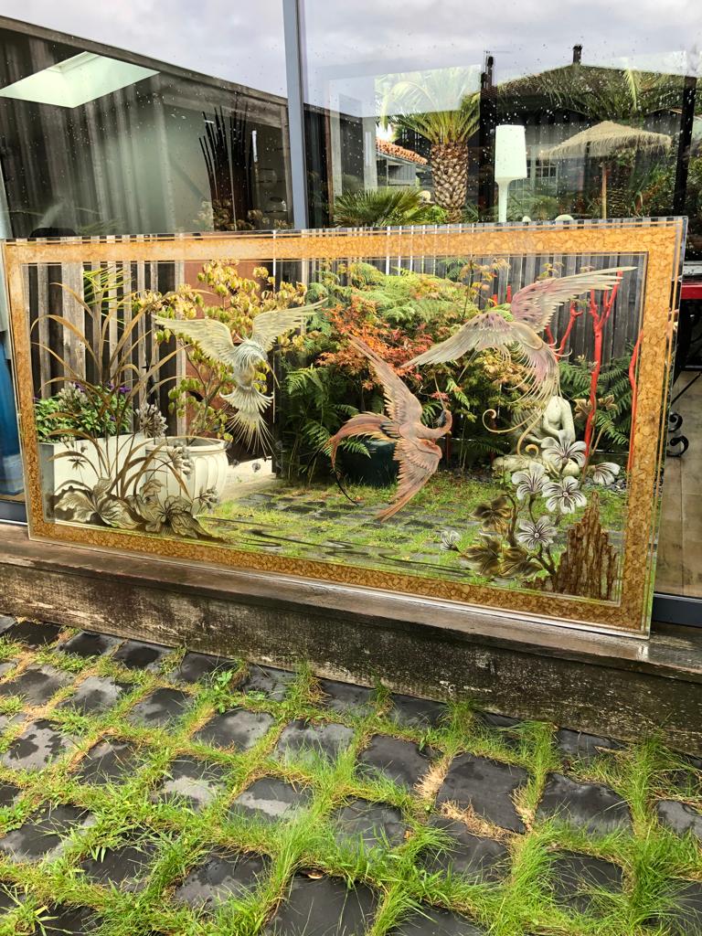 Mirror decorated with birds