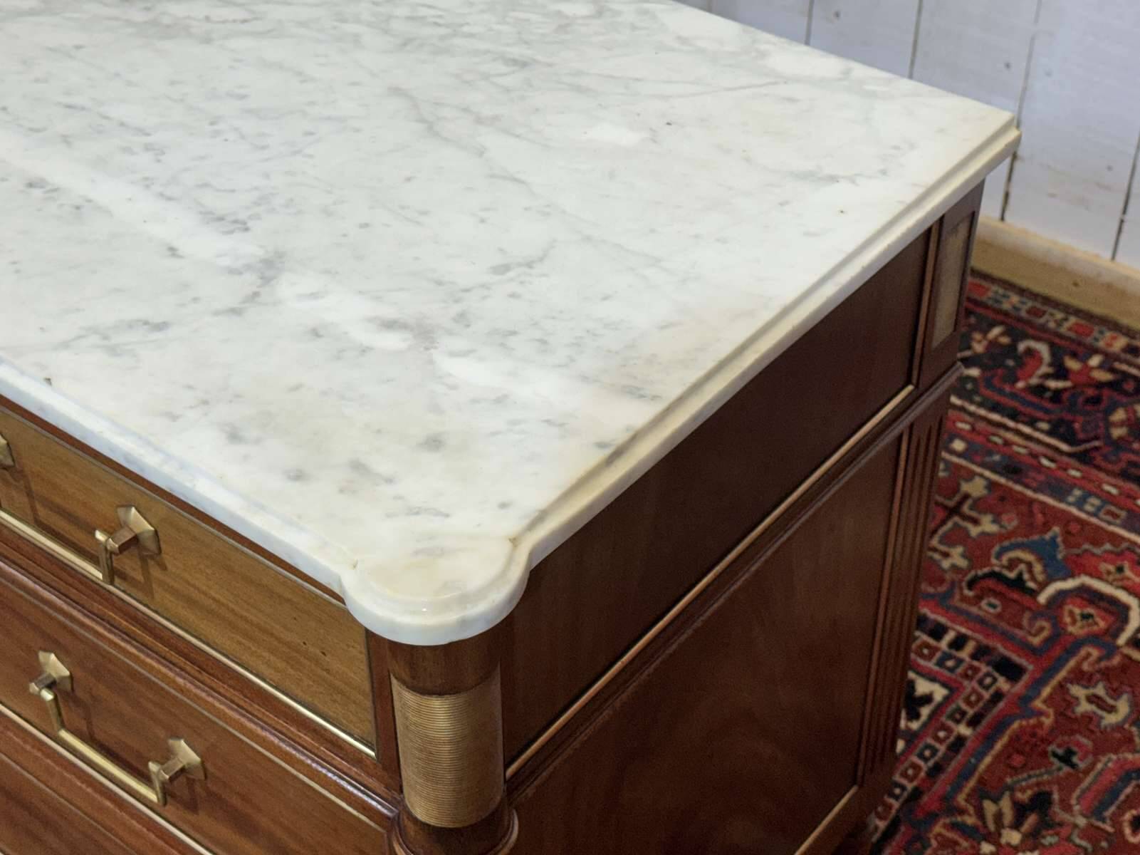 Louis XVI commode in mahogany with a marble top from the 1950s.
